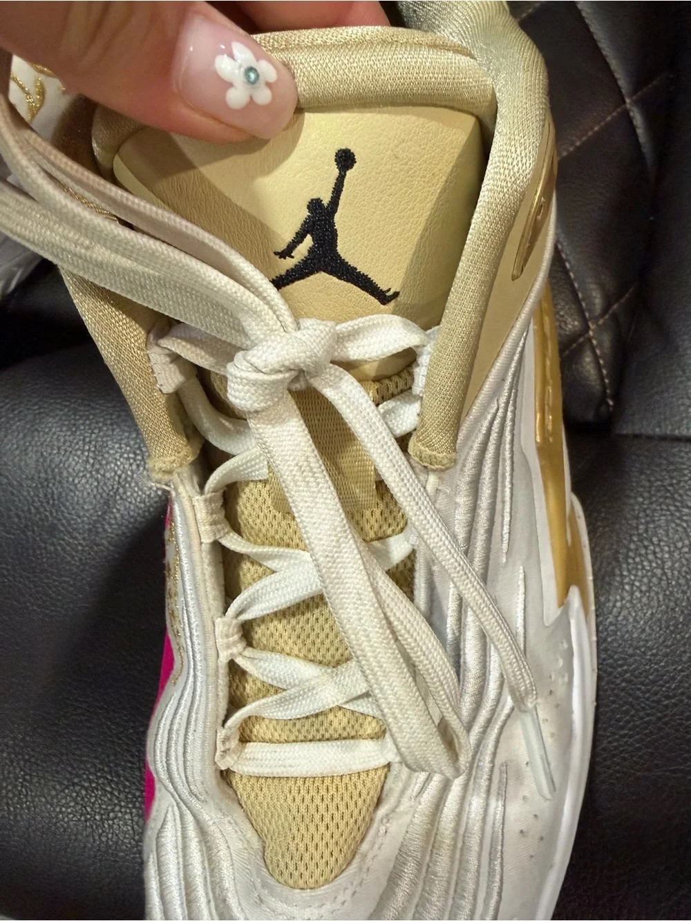 Jordan Men’s White Gold Basketball Sneakers with Pink Accent